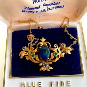 Blue fire pendant/brooch on 18” gold chain